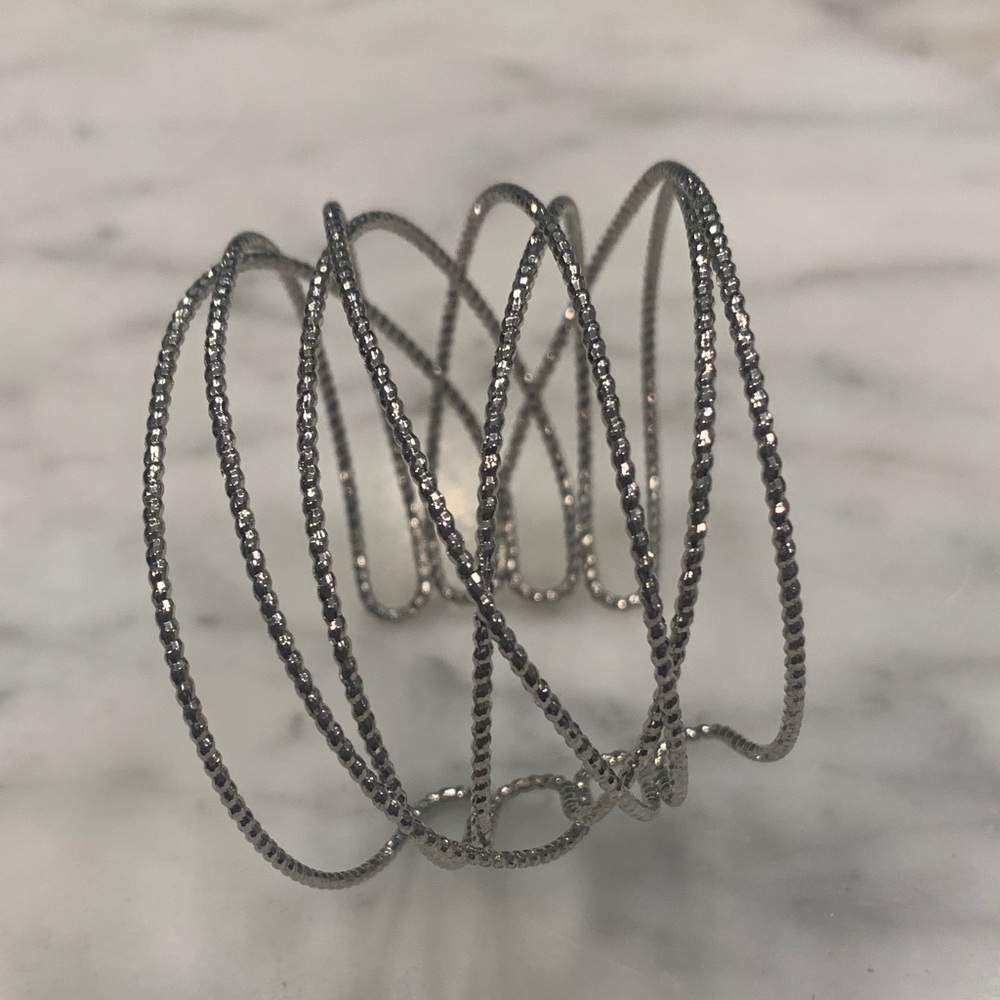 Elegant diamond cut Silver Spiral Bracelet